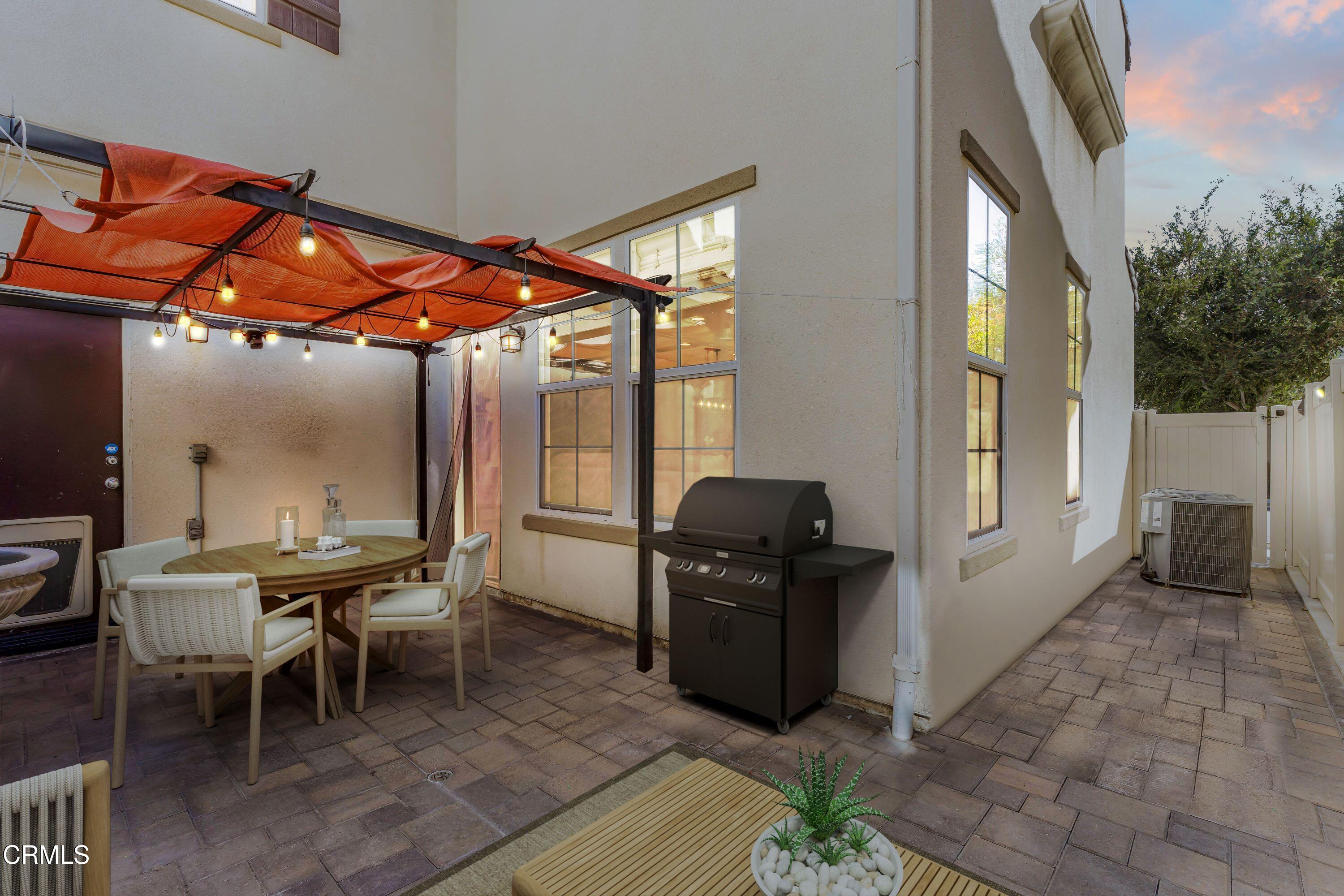 241 Stonegate Road Camarillo, CA 93010 - Photo 30 of 33 a dining room with furniture and a floor to ceiling window