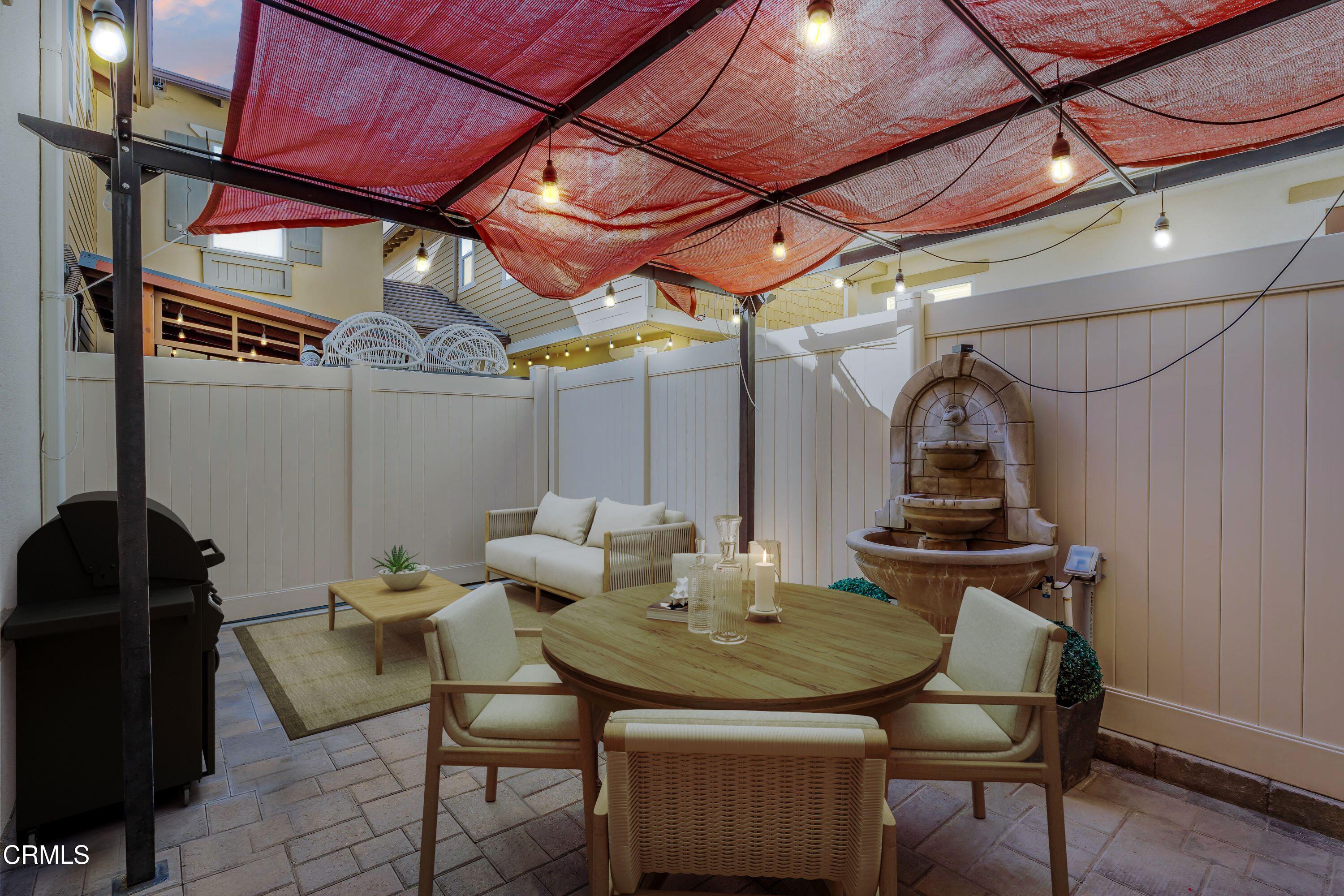 241 Stonegate Road Camarillo, CA 93010 - Photo 31 of 33 a dining room with furniture and a table