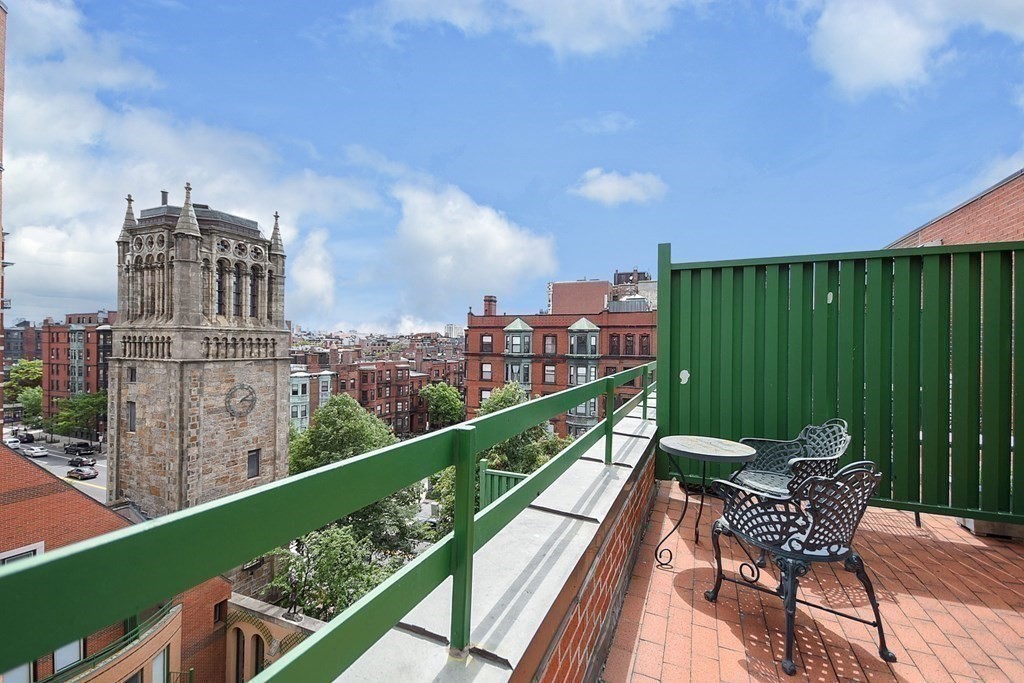 492 Beacon Street, Unit 82 Boston, MA 02115 - Photo 19 of 21 a view of a city from a balcony with seating space