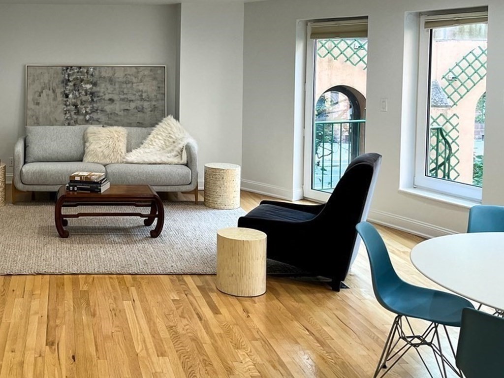 492 Beacon Street, Unit 82 Boston, MA 02115 - Photo 4 of 21 a living room with furniture and a window