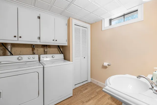 a bathroom with a sink a toilet and vanity