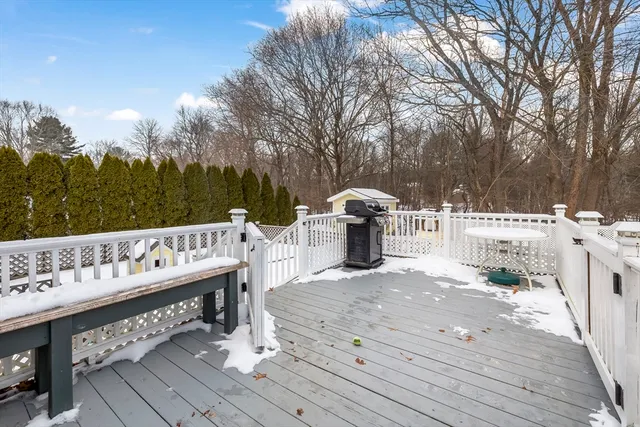 a view of parking garage with cars parked