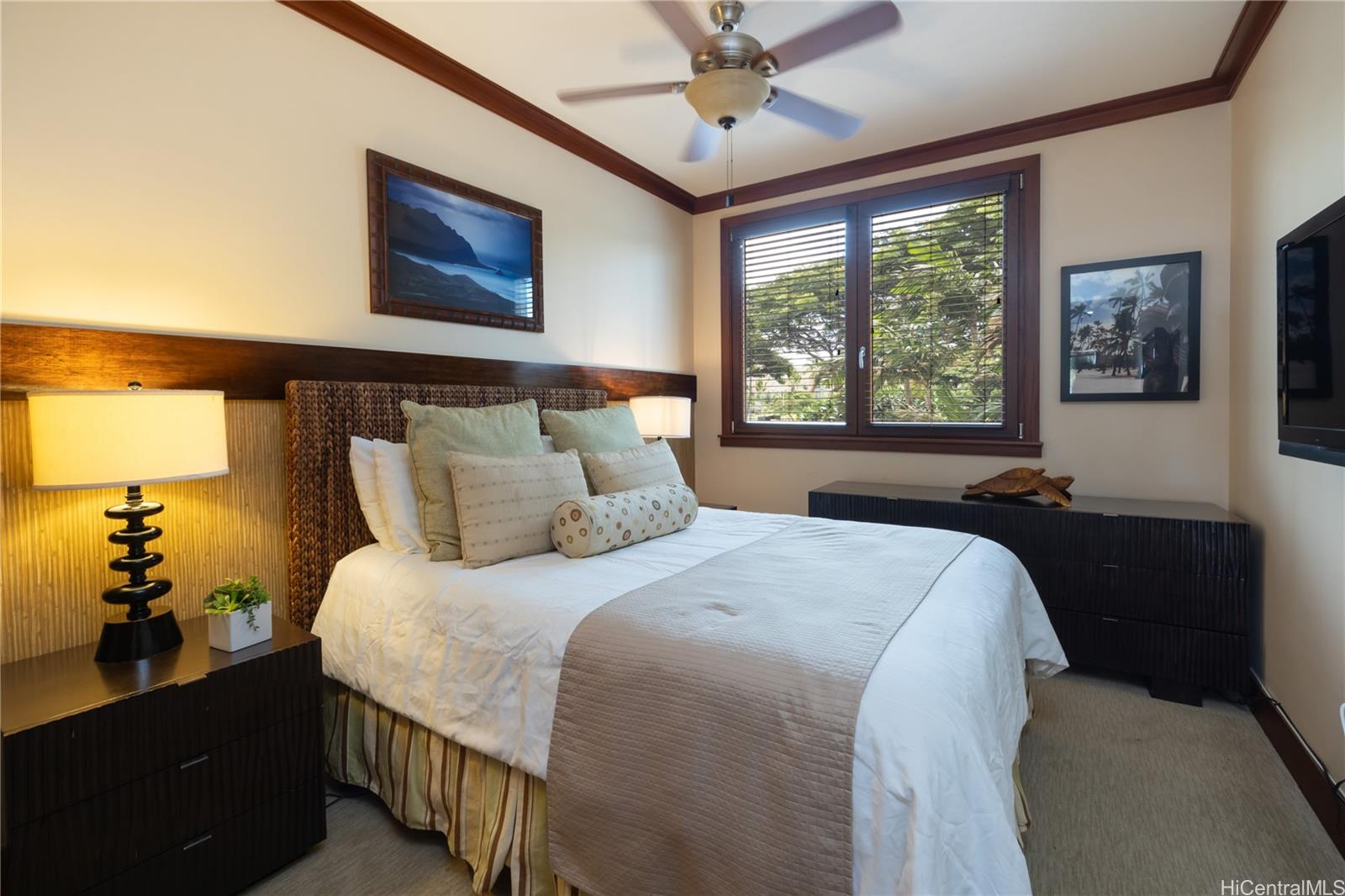 92-104 Waialii Place, Unit O202 Kapolei, HI 96707 - Photo 18 of 25 a bedroom with bed and a window