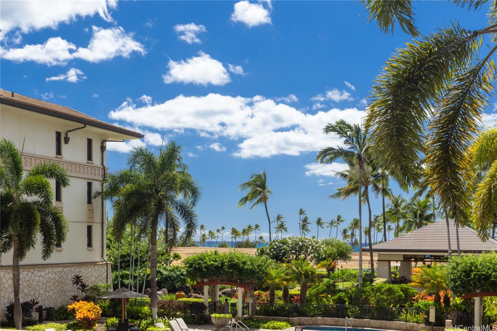 92-104 Waialii Place, Unit O202 Kapolei, HI 96707 - Photo 2 of 25 a view of a house with a yard and potted plants