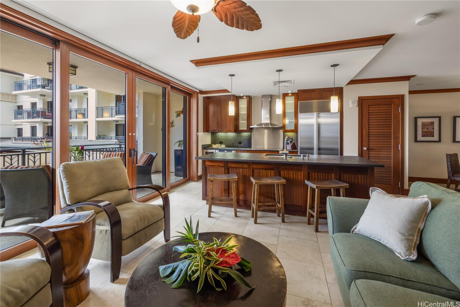 92-104 Waialii Place, Unit O202 Kapolei, HI 96707 - Photo 9 of 25 a living room with furniture and a large window