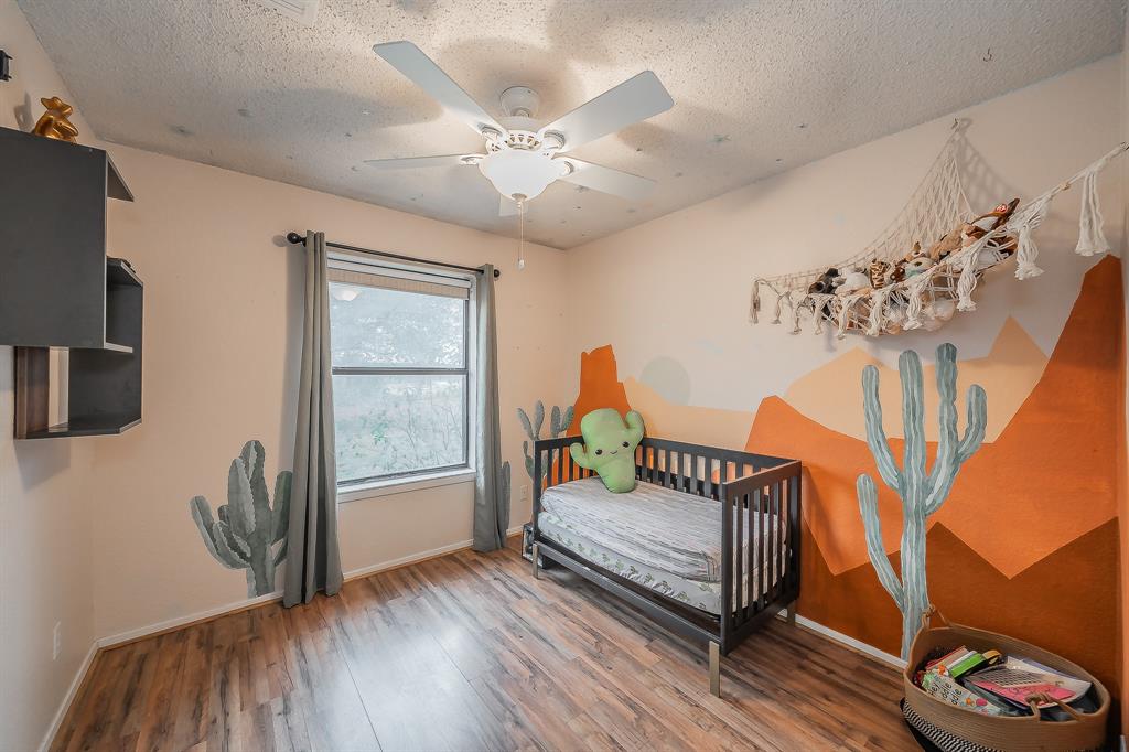 102 Perdue Circle Weatherford, TX 76085 - Photo 19 of 39 a view of a livingroom with furniture and a chandelier