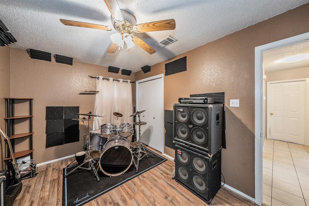 102 Perdue Circle Weatherford, TX 76085 - Photo 22 of 39 a view of a room with gym equipment