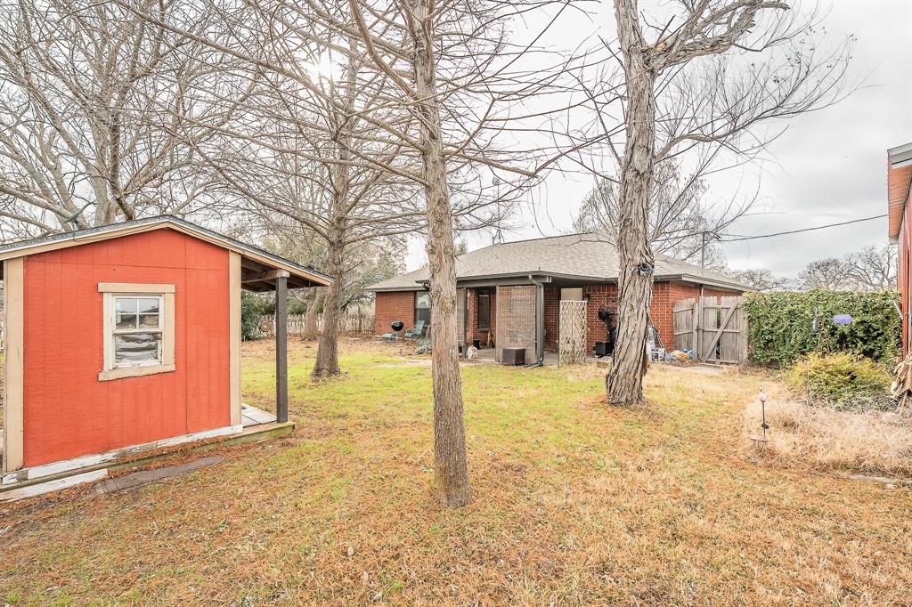 102 Perdue Circle Weatherford, TX 76085 - Photo 24 of 39 a view of a house with a yard covered in snow