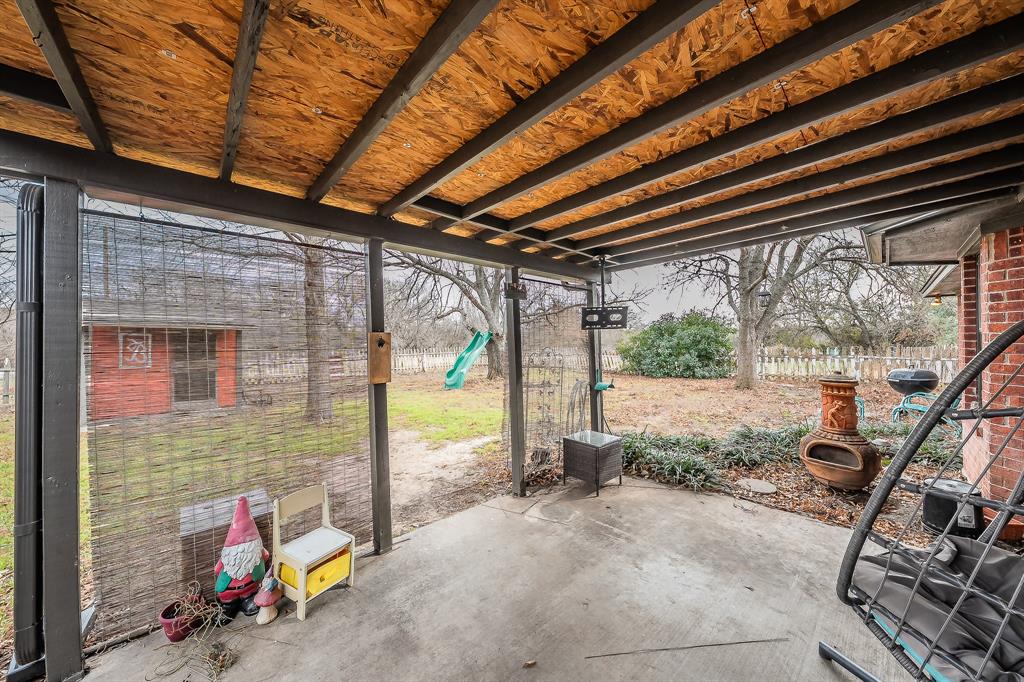 102 Perdue Circle Weatherford, TX 76085 - Photo 25 of 39 a backyard of a house with sofas