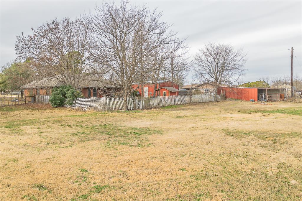 102 Perdue Circle Weatherford, TX 76085 - Photo 36 of 39 a view of residential houses with yard and swimming pool