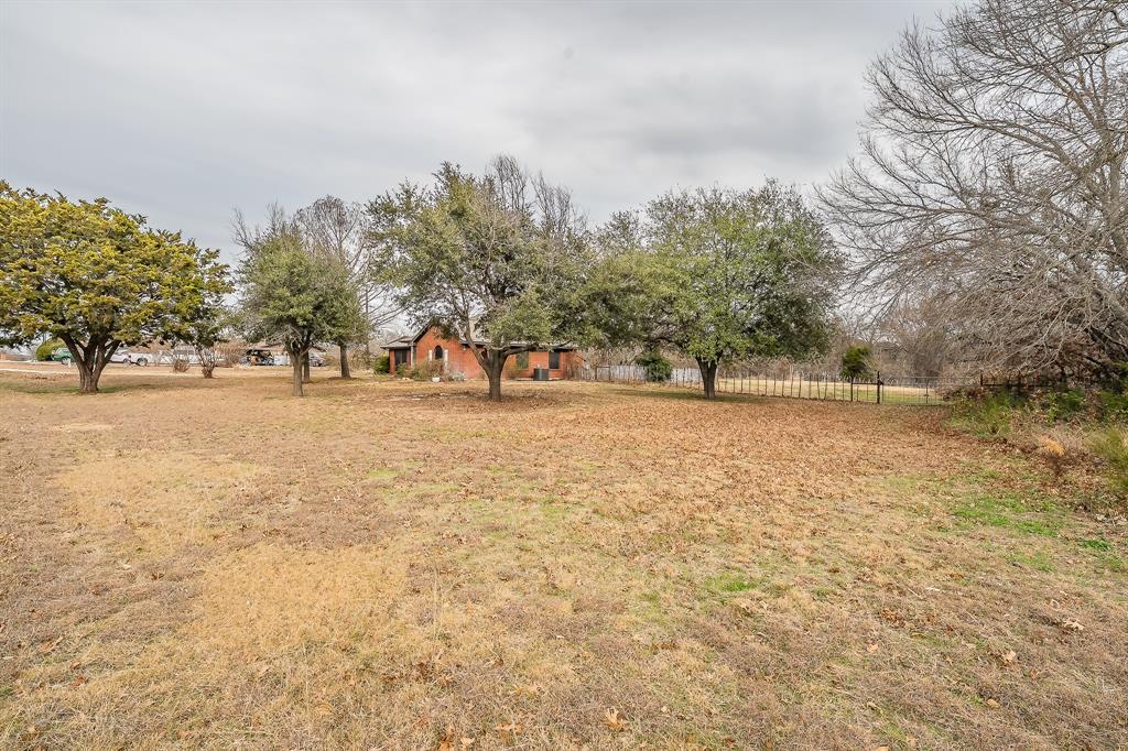 102 Perdue Circle Weatherford, TX 76085 - Photo 38 of 39 a view of yard with trees