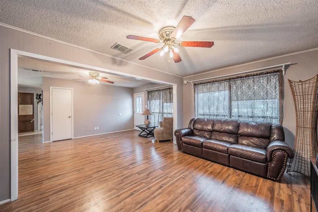 102 Perdue Circle Weatherford, TX 76085 - Photo 5 of 39 a living room with furniture and a large window