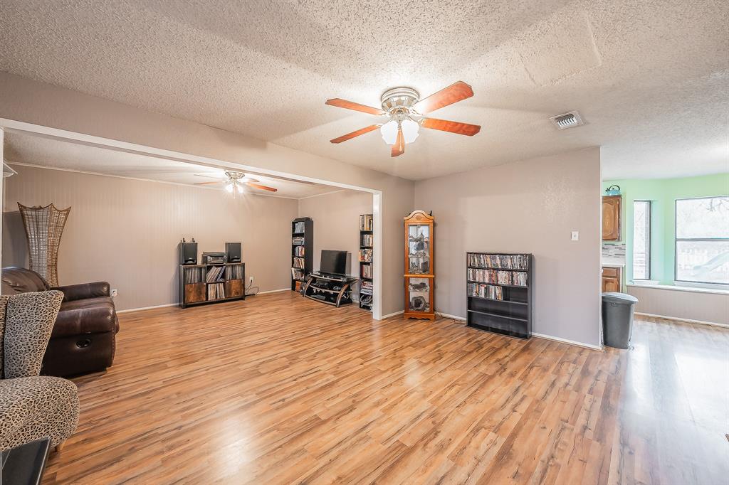 102 Perdue Circle Weatherford, TX 76085 - Photo 6 of 39 a view of a livingroom with a workspace