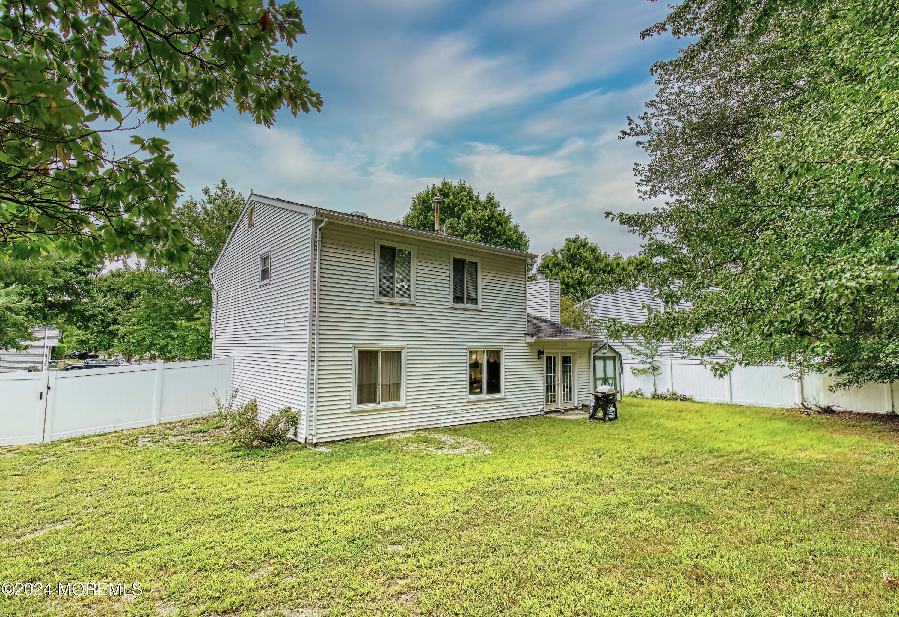 34 Sweetbriar Trail Howell, NJ 07731 - Photo 11 of 53 a front view of house with yard