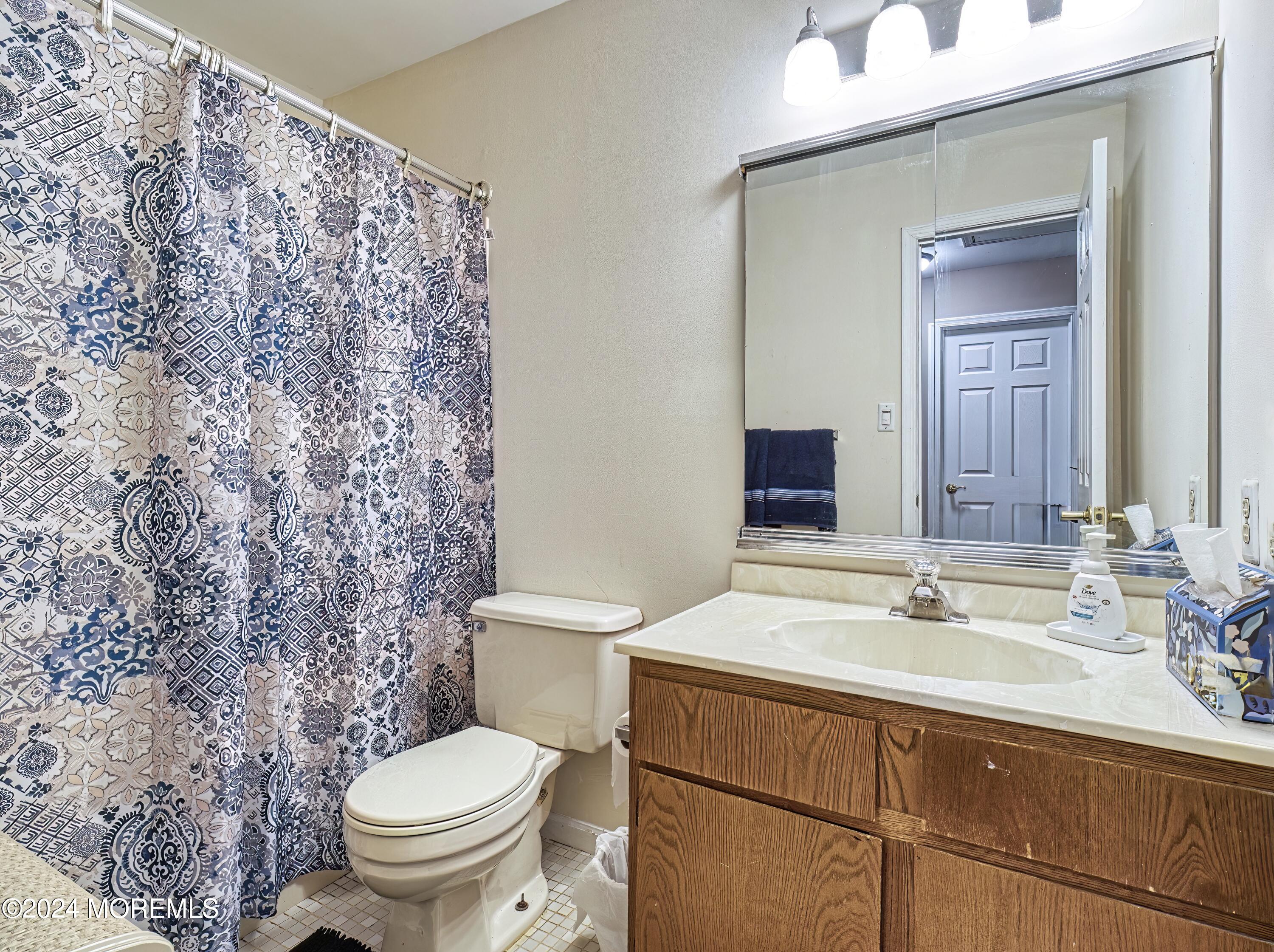 34 Sweetbriar Trail Howell, NJ 07731 - Photo 28 of 53 a bathroom with a sink and a toilet