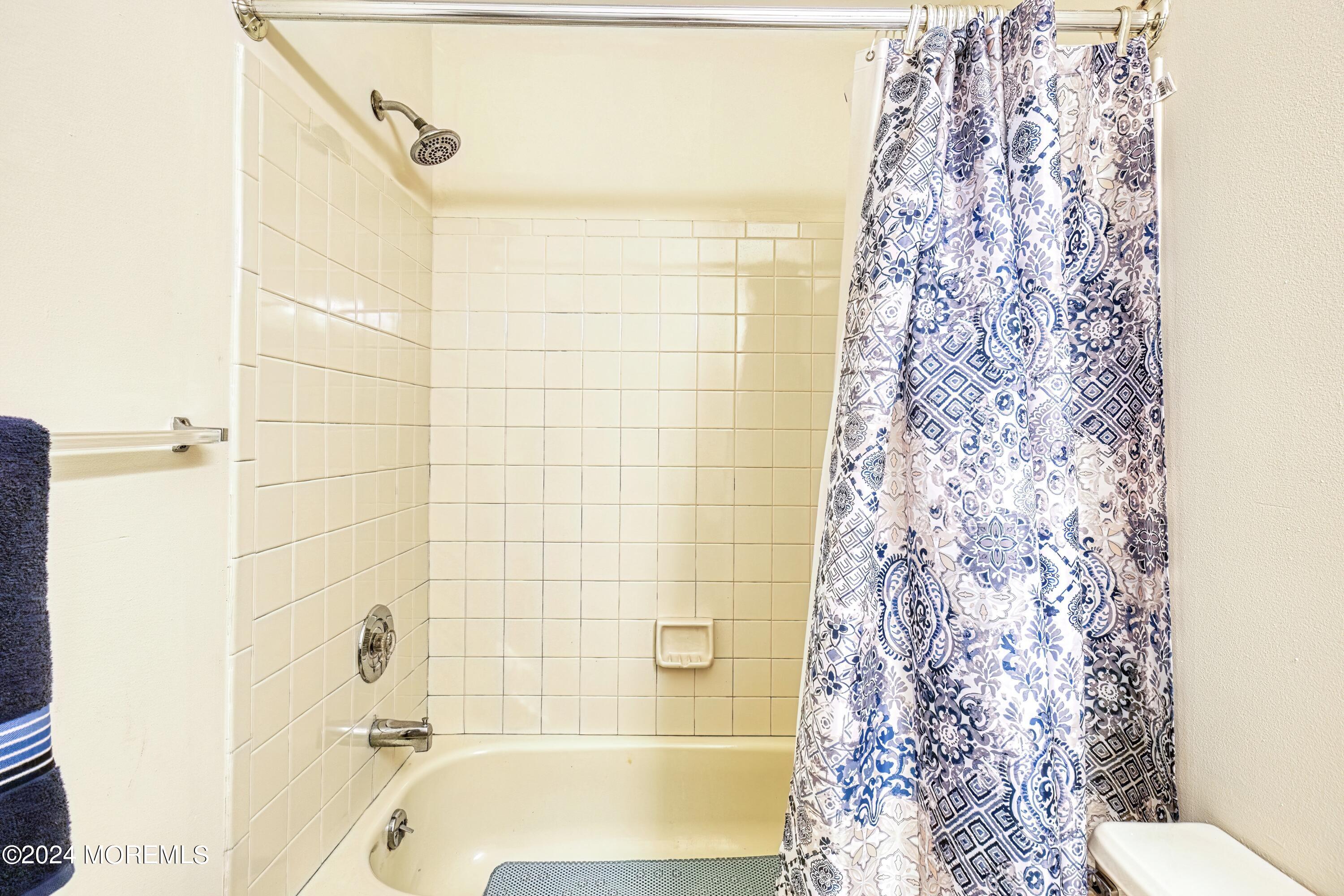34 Sweetbriar Trail Howell, NJ 07731 - Photo 30 of 53 a bathroom with a bathtub and shower