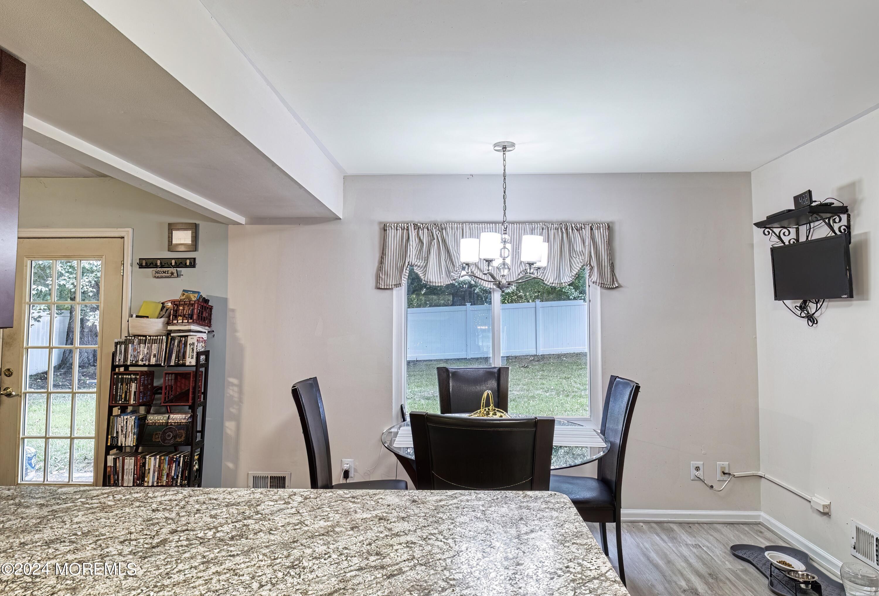 34 Sweetbriar Trail Howell, NJ 07731 - Photo 46 of 53 a view of a dining room with furniture