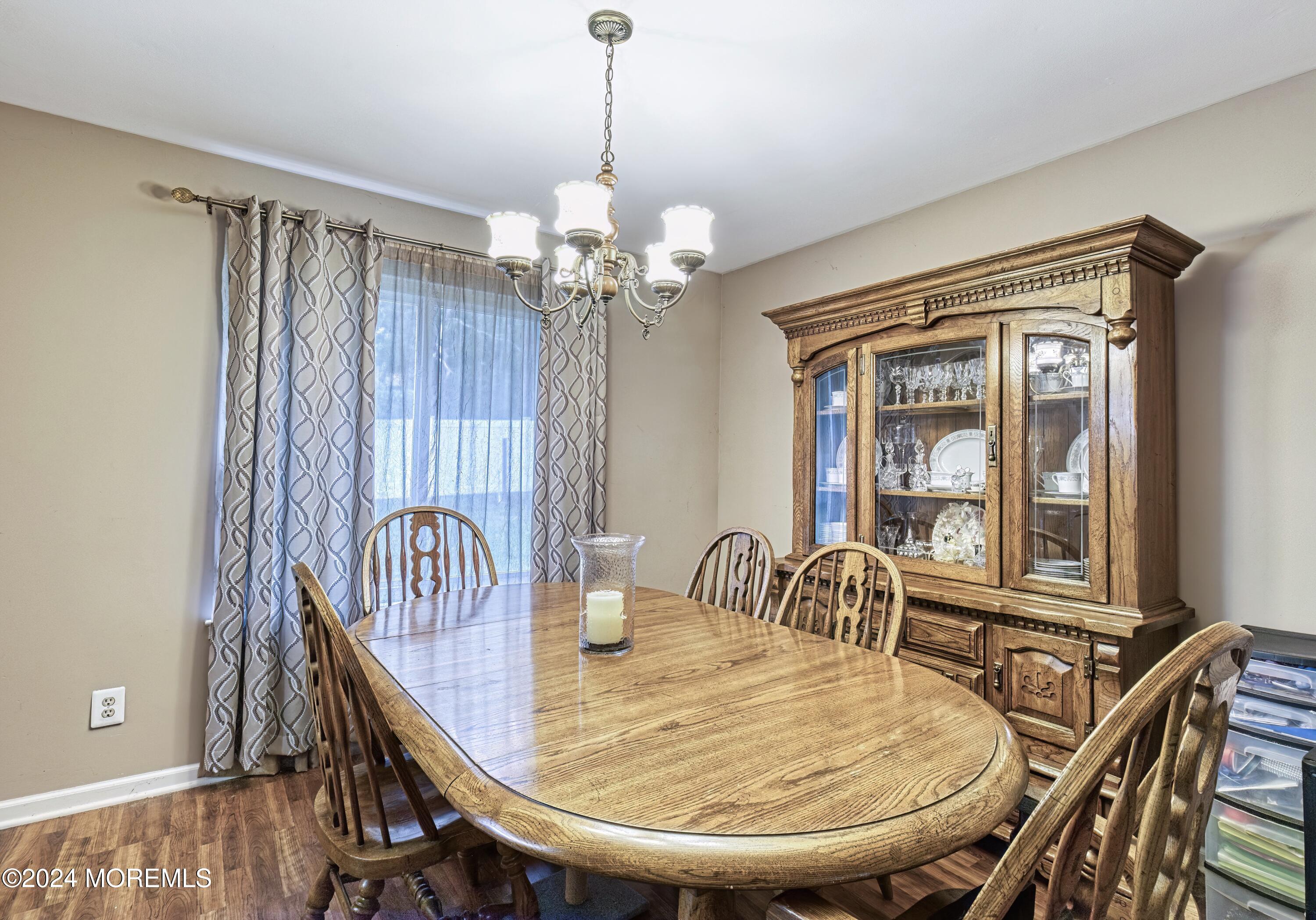34 Sweetbriar Trail Howell, NJ 07731 - Photo 50 of 53 a view of a dining room with furniture window and outside view