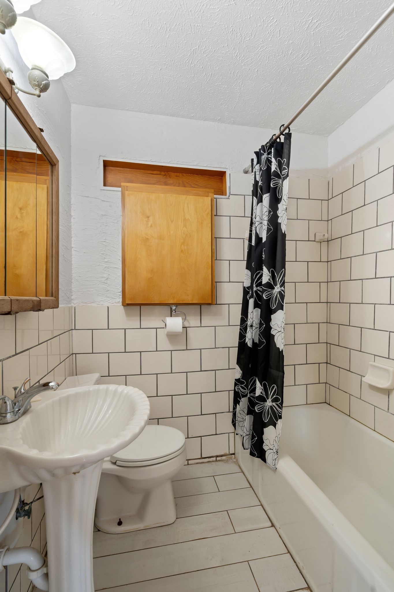 401 Neelys Bend Road Madison, TN 37115 - Photo 8 of 37 a bathroom with a sink a toilet and shower