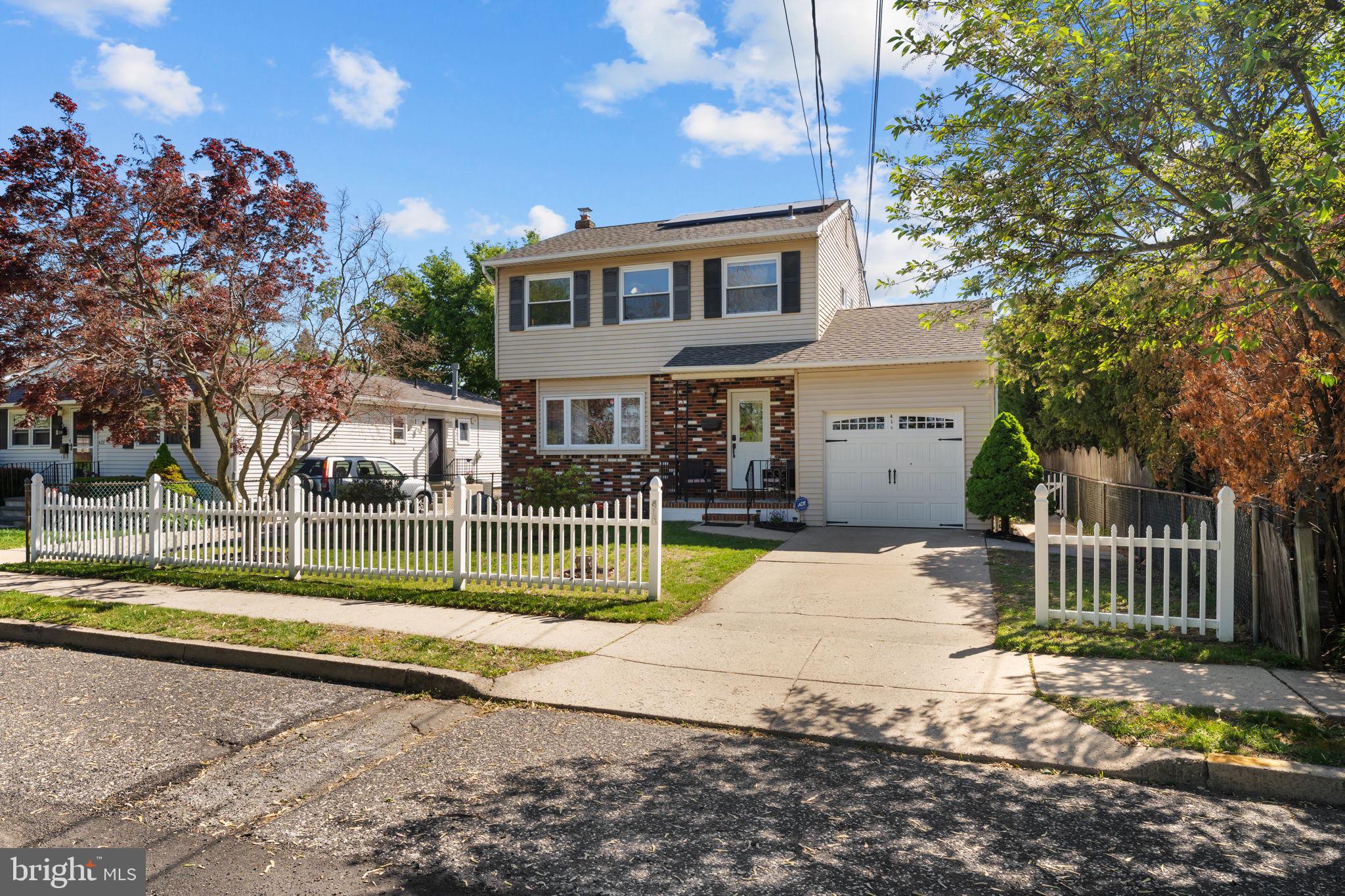 418 Harrison Street Riverside, NJ 08075 - Photo 1 of 29 a view of a house with a backyard and a patio