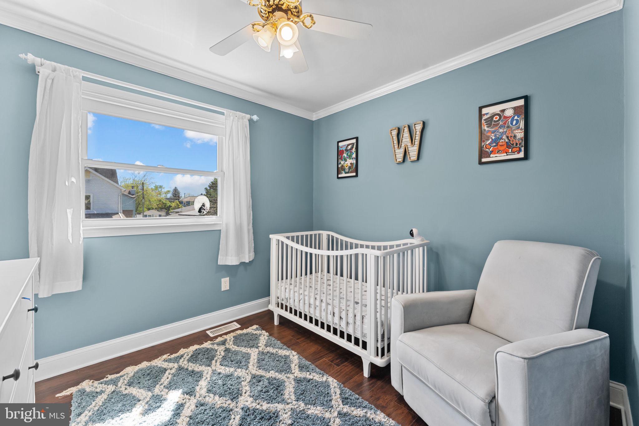 418 Harrison Street Riverside, NJ 08075 - Photo 15 of 29 a bedroom with furniture and a window