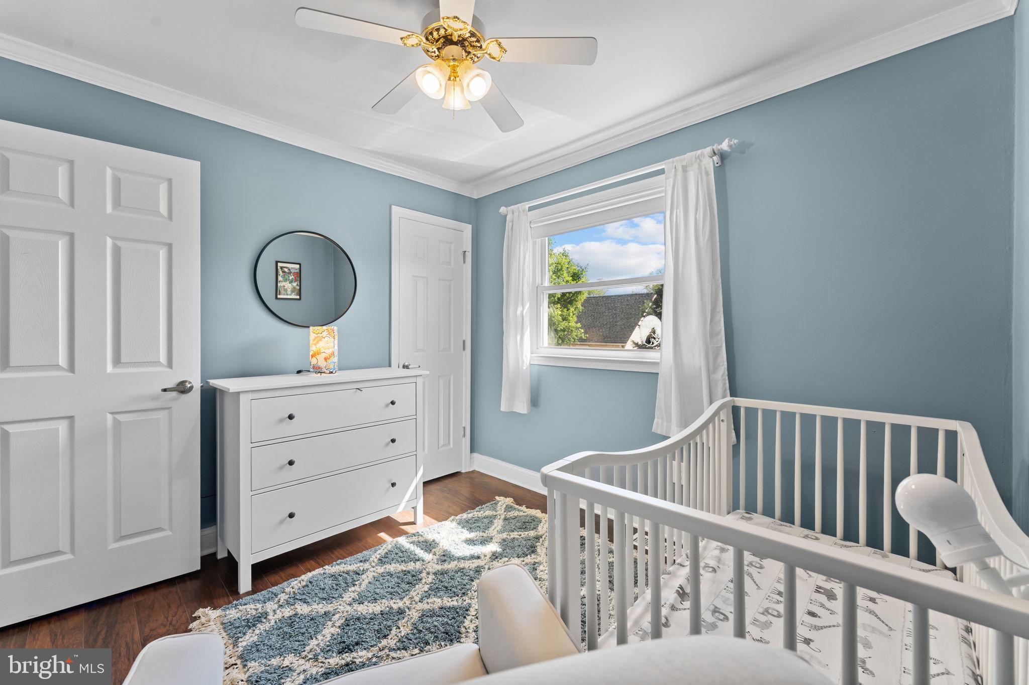 418 Harrison Street Riverside, NJ 08075 - Photo 16 of 29 a bedroom with a bed and a window