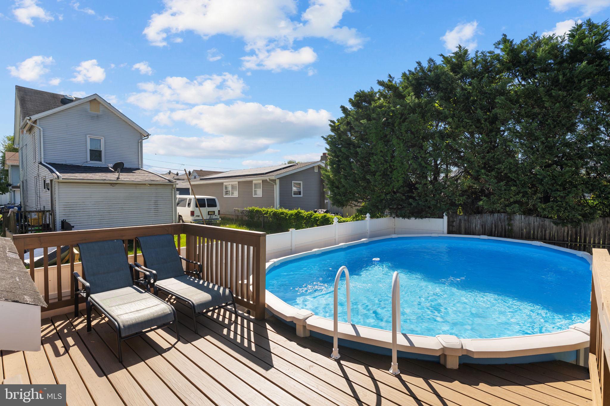 418 Harrison Street Riverside, NJ 08075 - Photo 28 of 29 a view of a balcony with wooden floor and outdoor seating