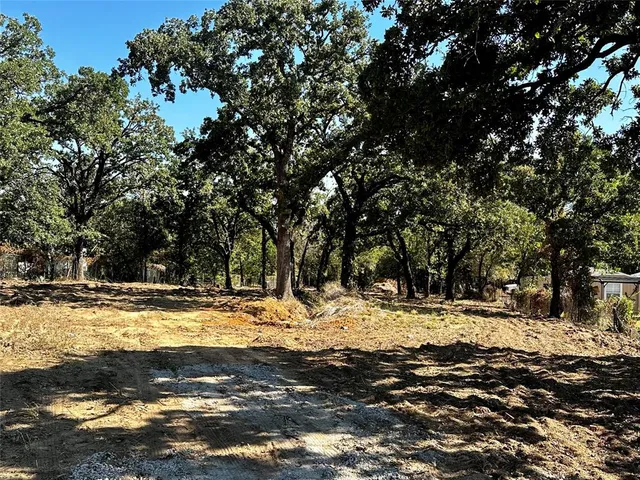 a view of a yard with snow