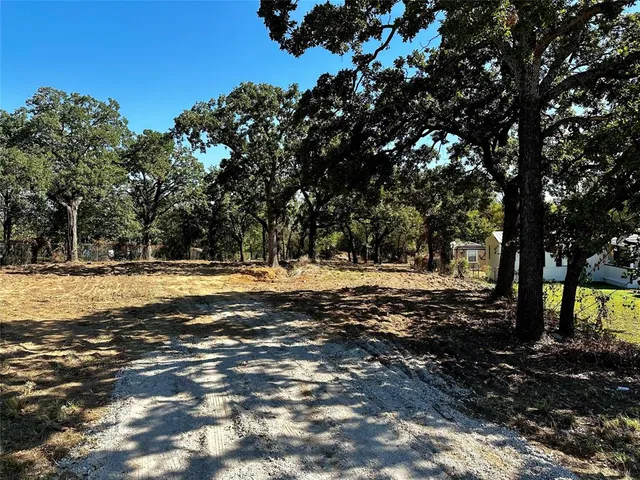a view of swimming pool with trees