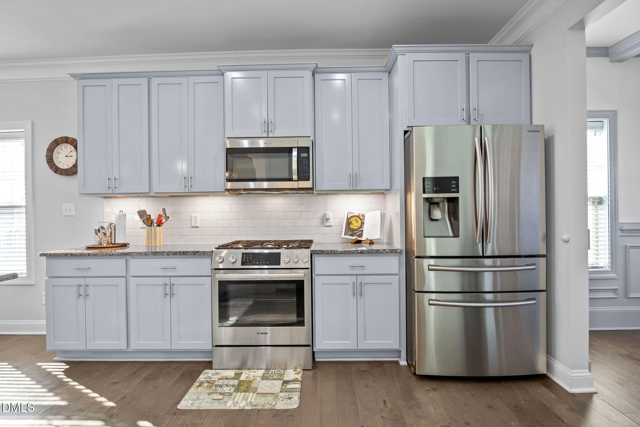 3528 Jones Lake Road Fuquay-Varina, NC 27526 - Photo 11 of 50 a kitchen with stainless steel appliances granite countertop a refrigerator stove and sink