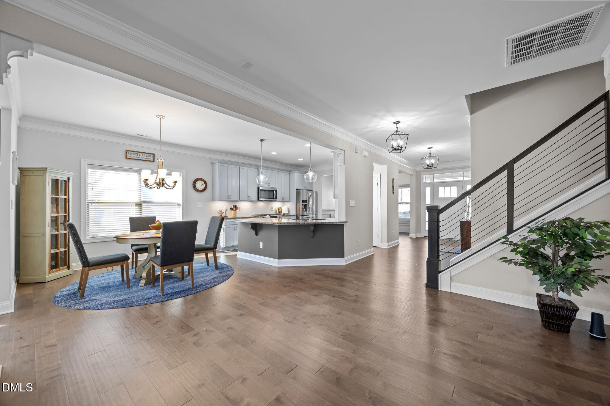 3528 Jones Lake Road Fuquay-Varina, NC 27526 - Photo 16 of 50 a view of a dining room with furniture window and wooden floor