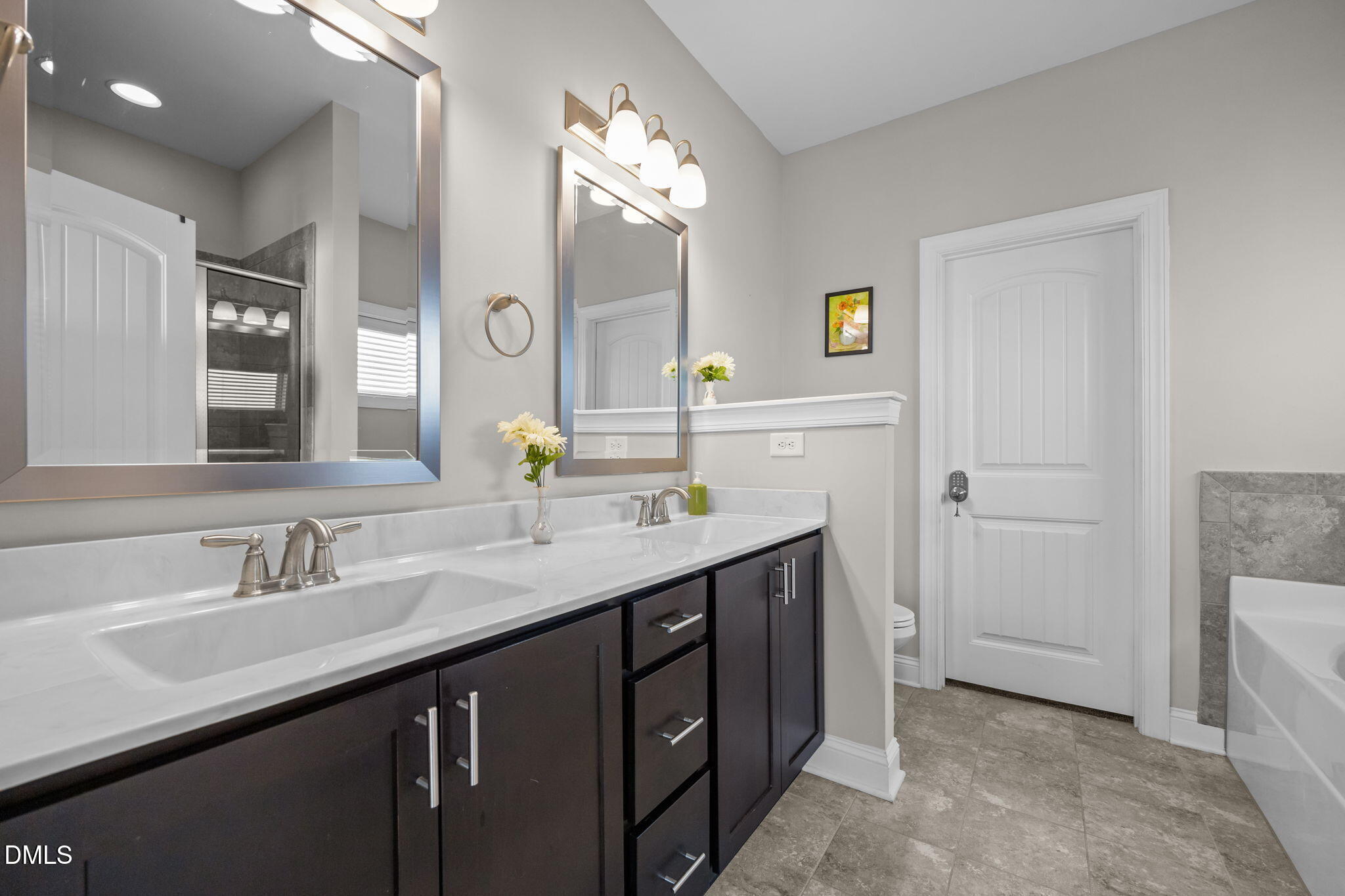 3528 Jones Lake Road Fuquay-Varina, NC 27526 - Photo 23 of 50 a bathroom with a sink and a mirror