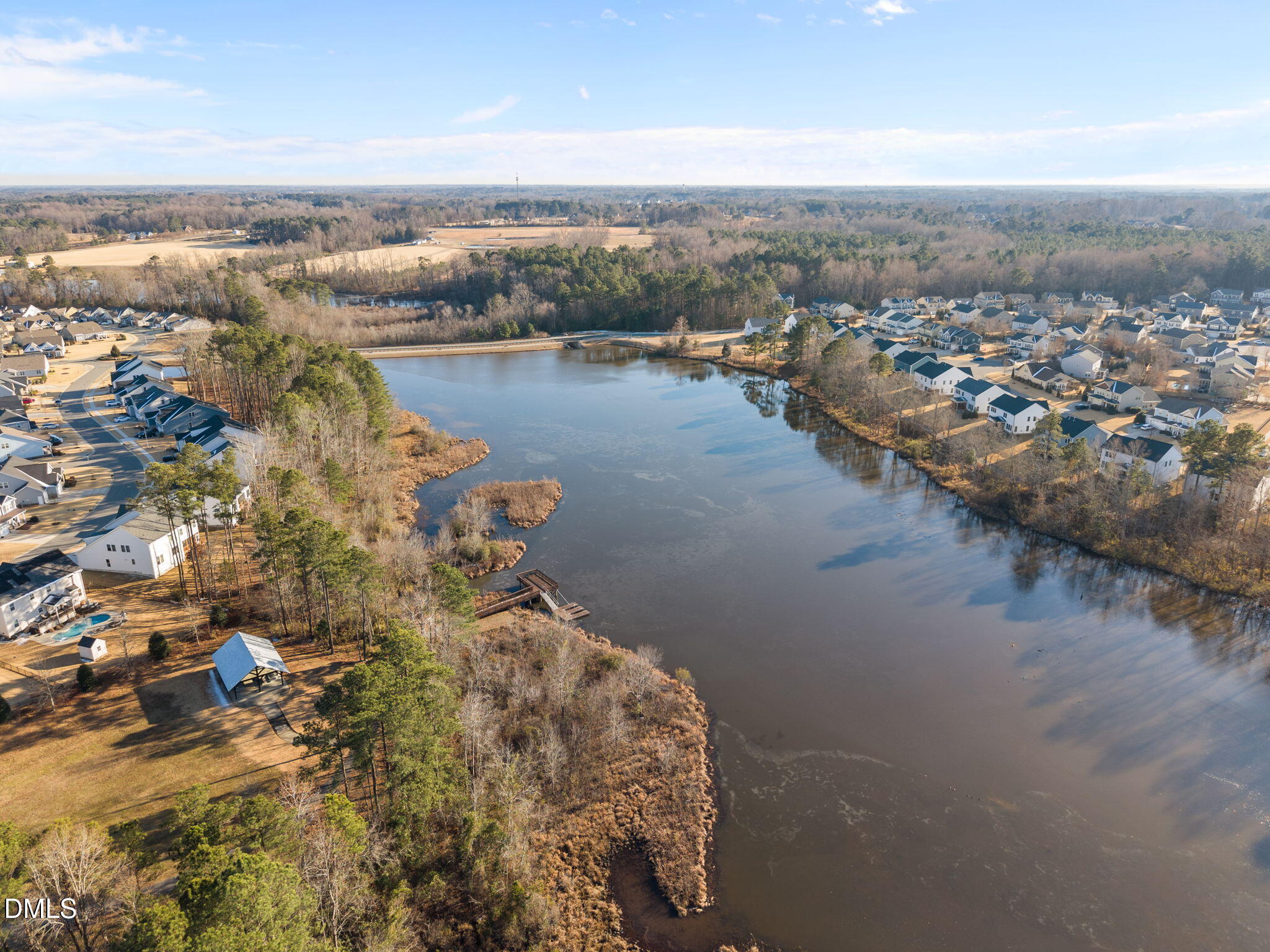 3528 Jones Lake Road Fuquay-Varina, NC 27526 - Photo 47 of 50 a view of a lake with a city