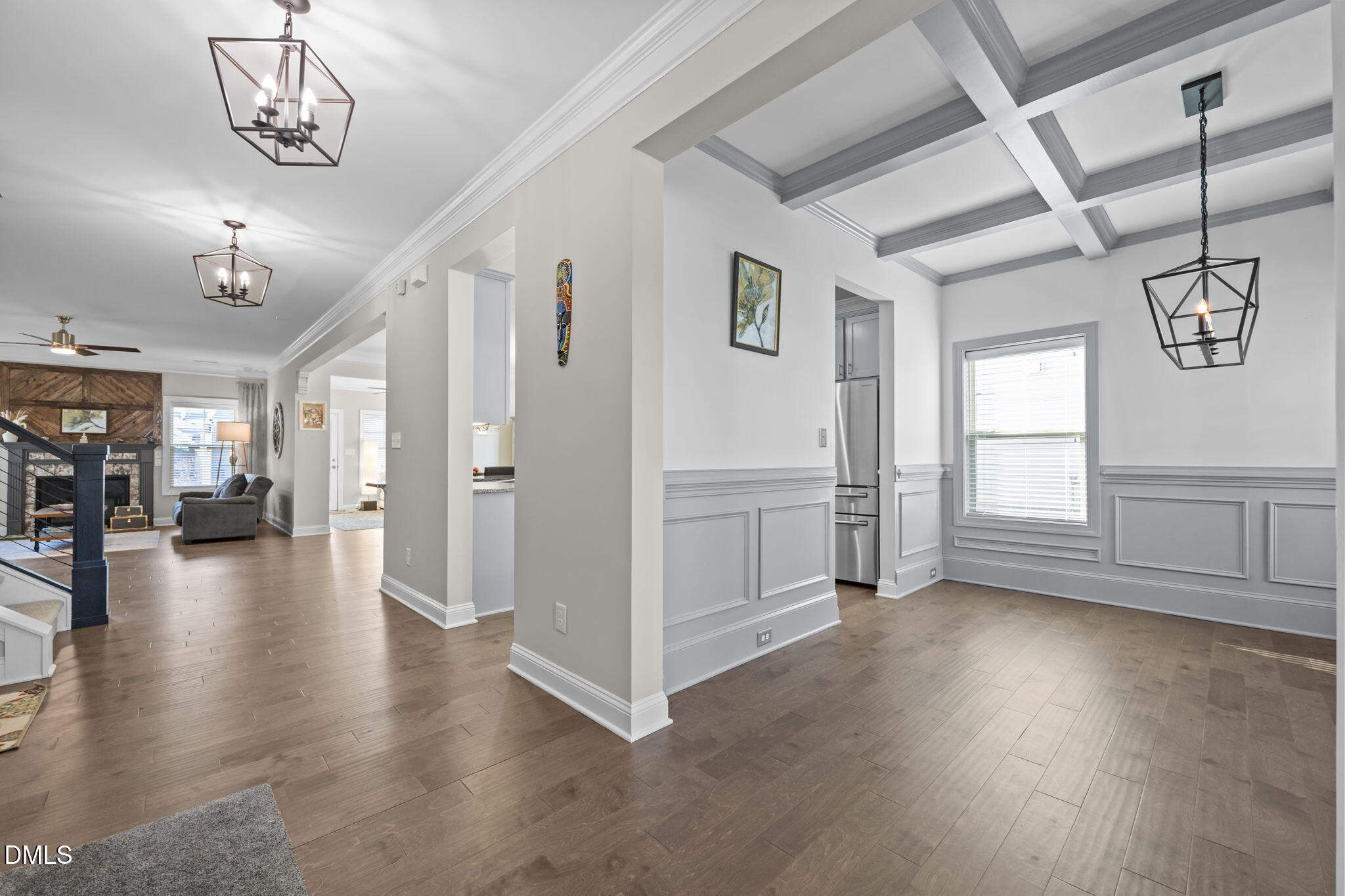 3528 Jones Lake Road Fuquay-Varina, NC 27526 - Photo 6 of 50 a view of a livingroom with hardwood floor and a ceiling fan