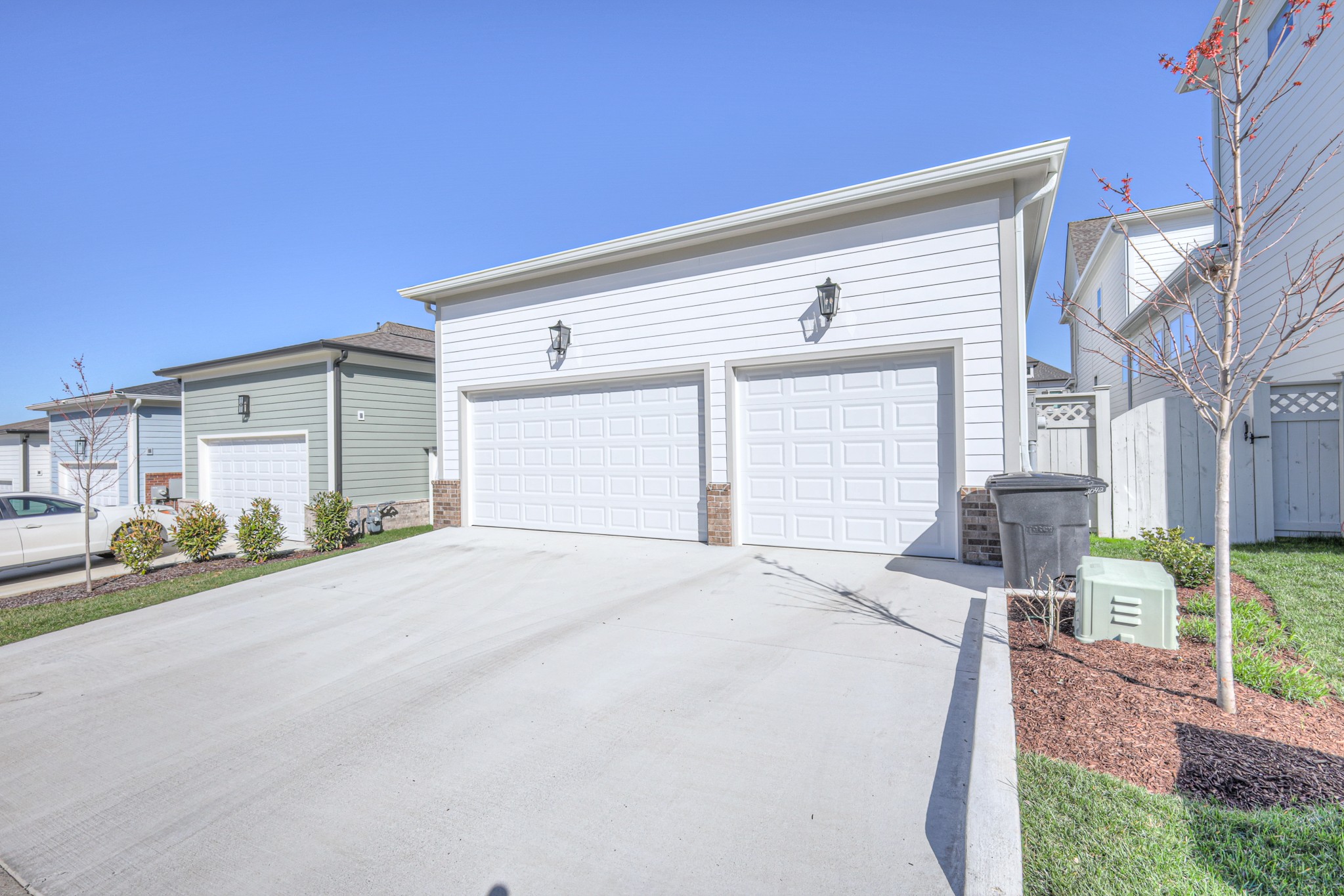 2042 Nathaniel Road Franklin, TN 37064 - Photo 40 of 40 a front view of a house with a yard and garage