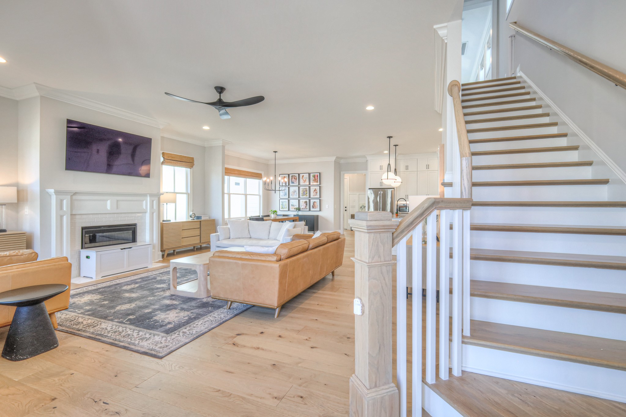 2042 Nathaniel Road Franklin, TN 37064 - Photo 5 of 40 a living room with furniture and a fireplace