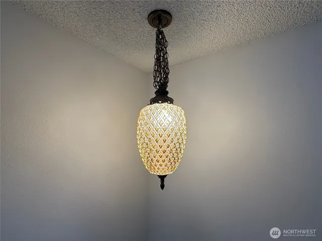 a close view of a light fixtures and a window