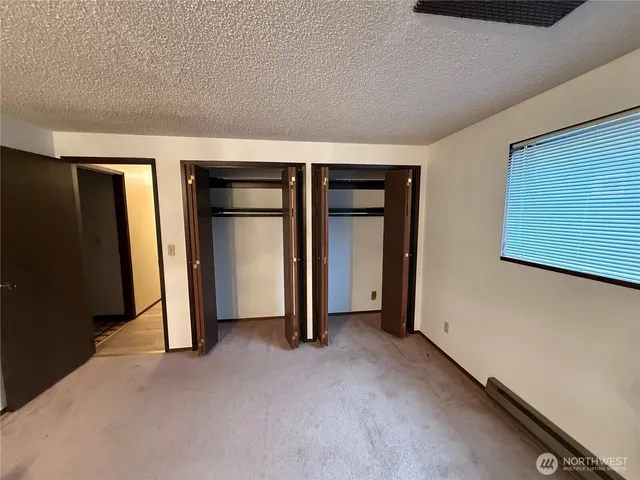 an empty room with closet