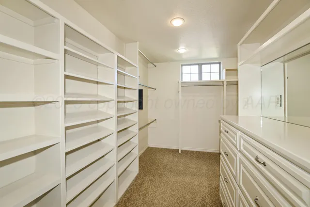 a bathroom with a sink a vanity and granite