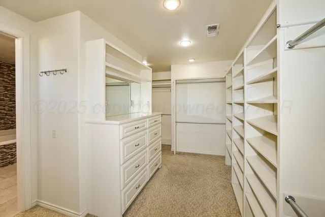 a bathroom with a sink and shower