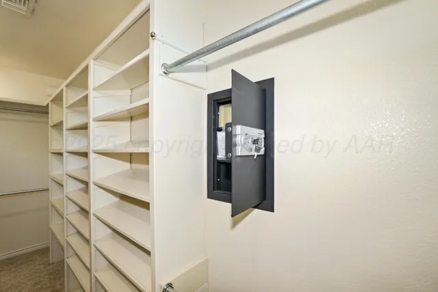 a view of a livingroom with wooden floor