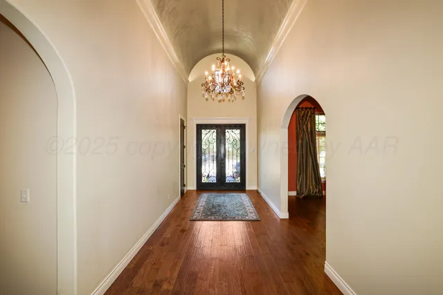 a view of entryway with wooden floor