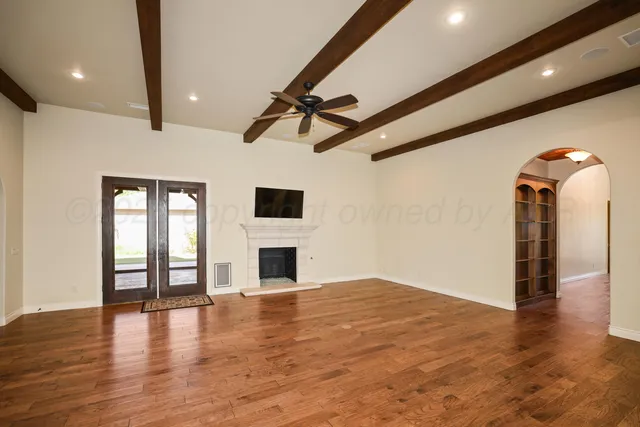 a view of kitchen with stainless steel appliances granite countertop counter top and cabinets