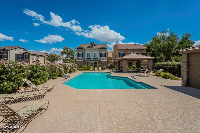 a view of a house with a swimming pool