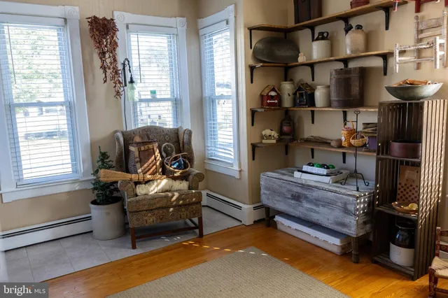 a room with furniture and a window