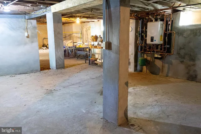 a view of a room with wooden walls