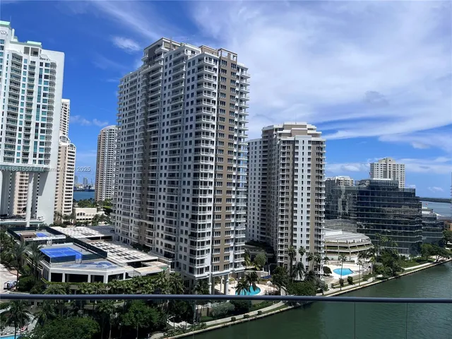 a view of city with tall buildings
