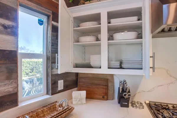 a bedroom with bed and window