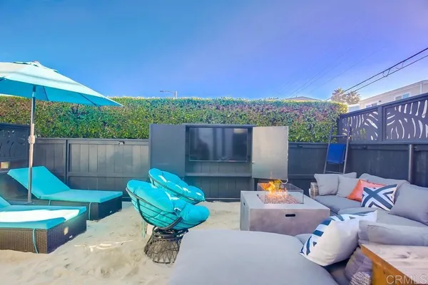 a backyard of a house with seating space