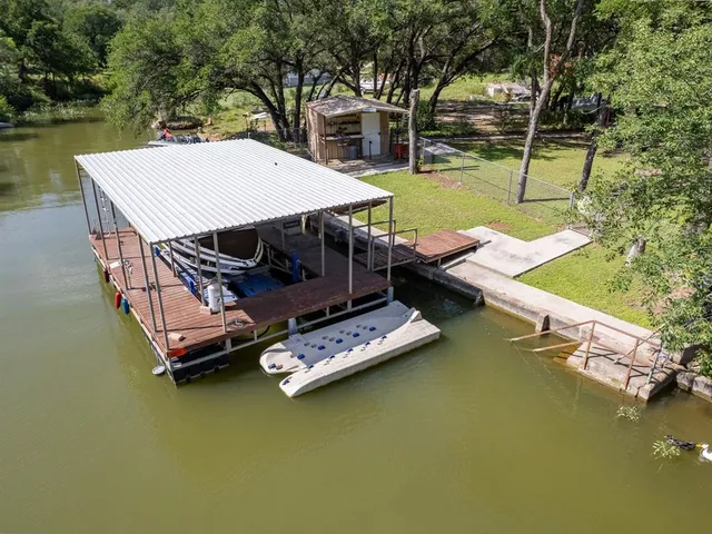 a view of a patio with swimming pool